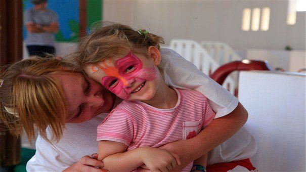 Face painted child with Nanny