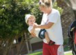 nanny laughing with young child in lakitira