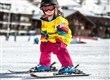 Little one on skis on holiday.