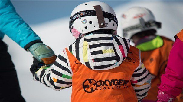 Children skiing on holiday