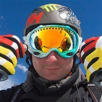 Skiier in helmet and goggles