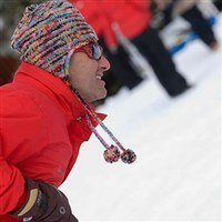 man focusing on skiing in moris