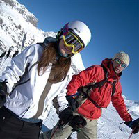 Couple in ski gear