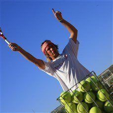 tennis instructor in action in lakitira