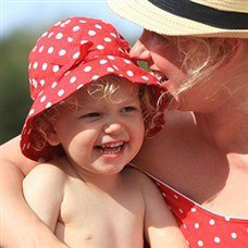 mother and child by the pool in perdepera