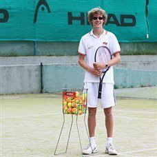 tennis instructor on courts in perdepera