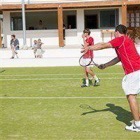 tennis instructor in a game of tennis in levante