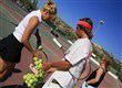 tennis instructor in action in lakitira